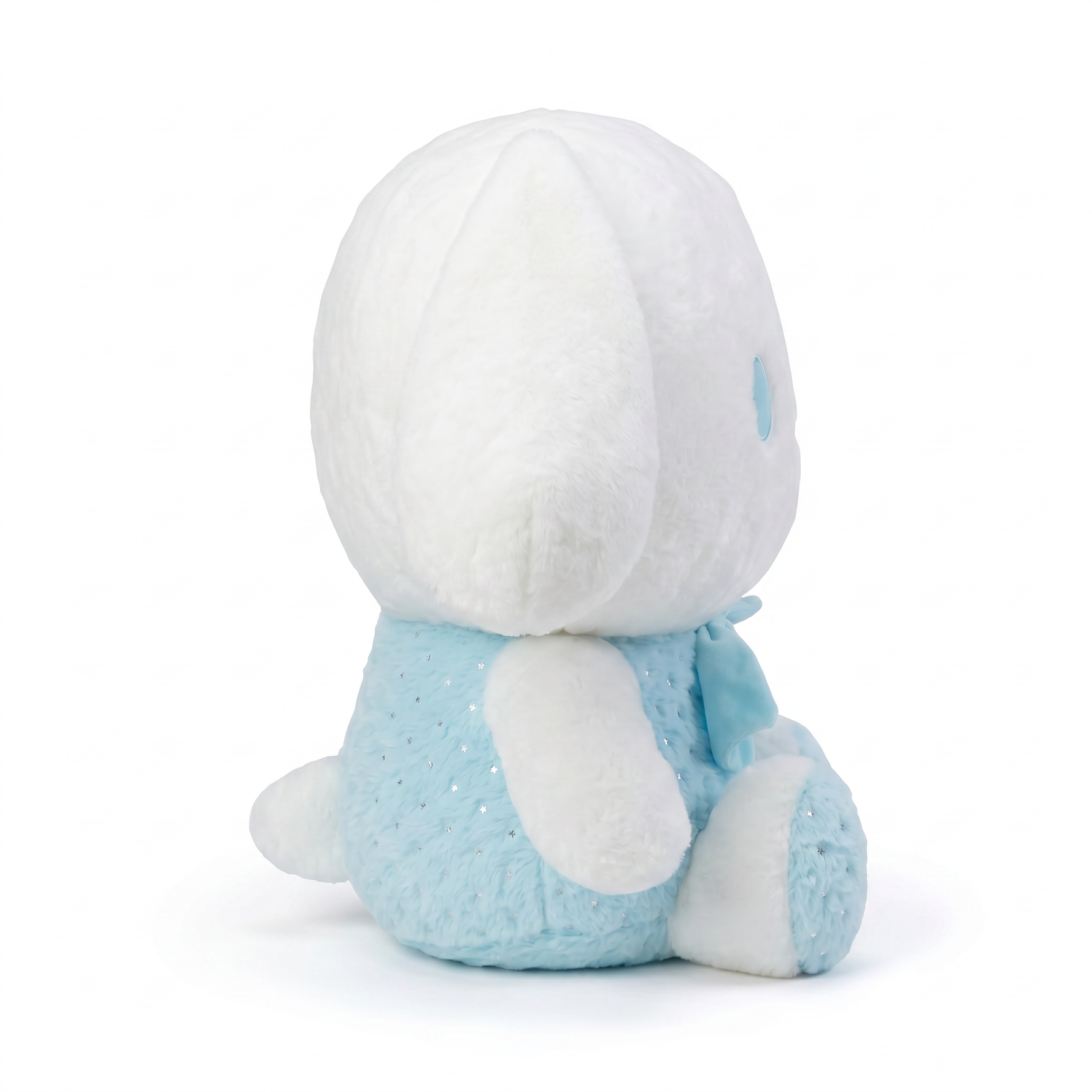 White bunny character plush in blue heart-print dress, side view