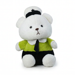 White teddy bear plush in green sailor outfit and cap