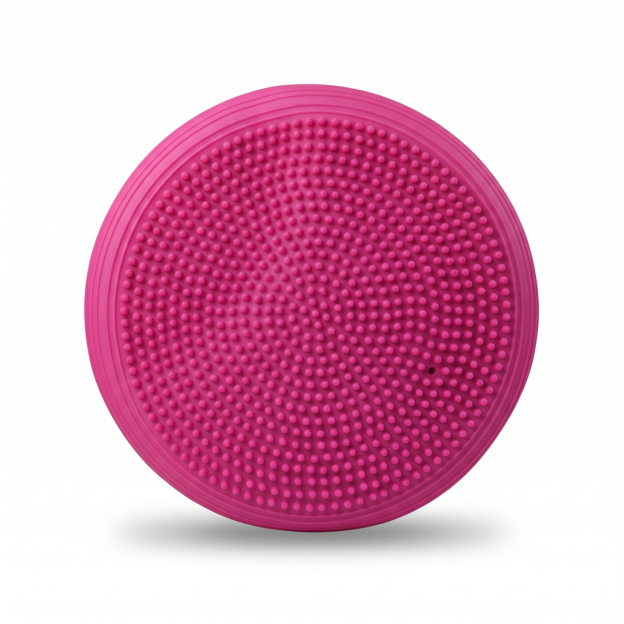 Pink inflatable balance cushion — textured massage-nub side