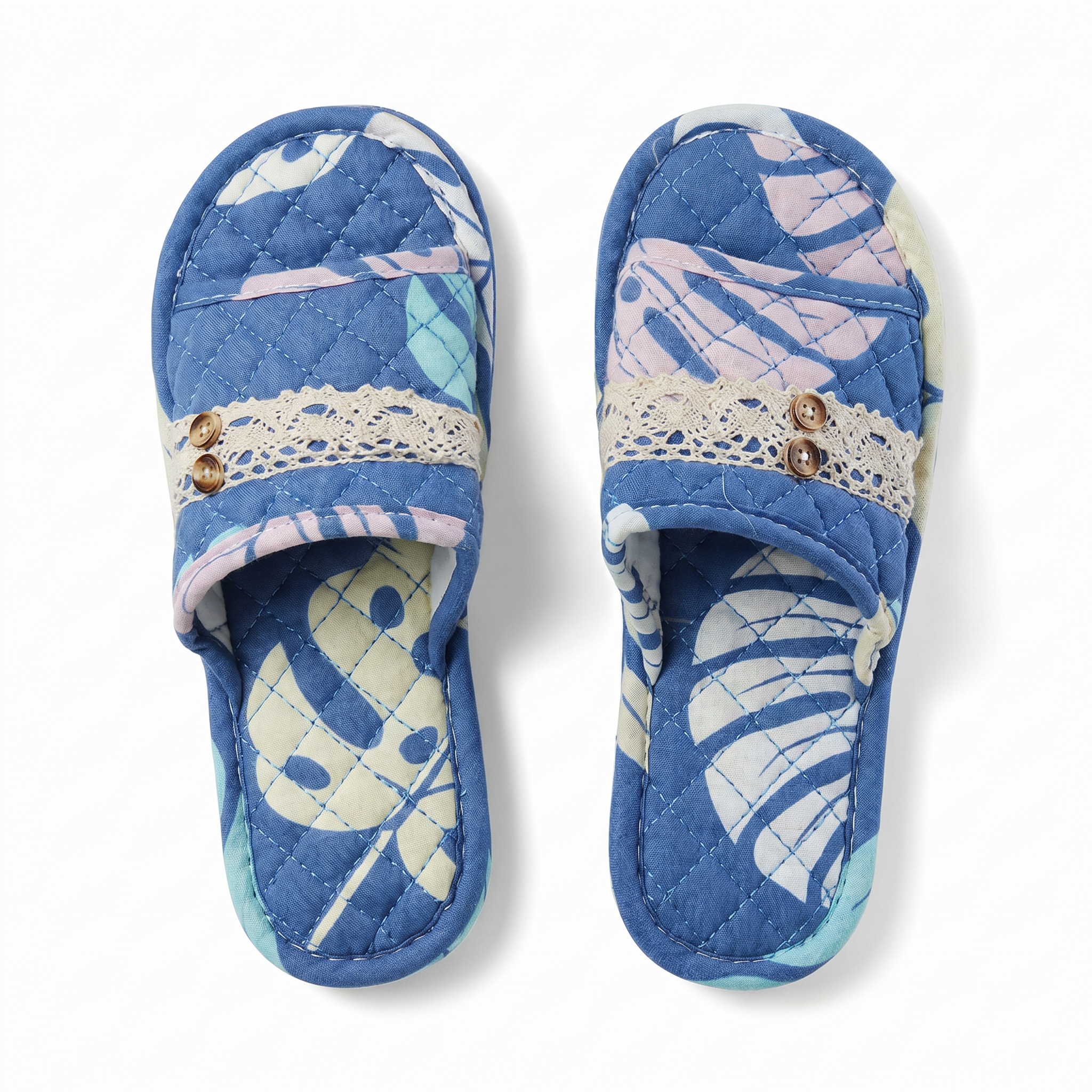 Blue tropical-leaf print quilted house slippers with crochet trim