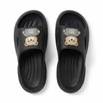 Black EVA slide slippers with brown bear face applique