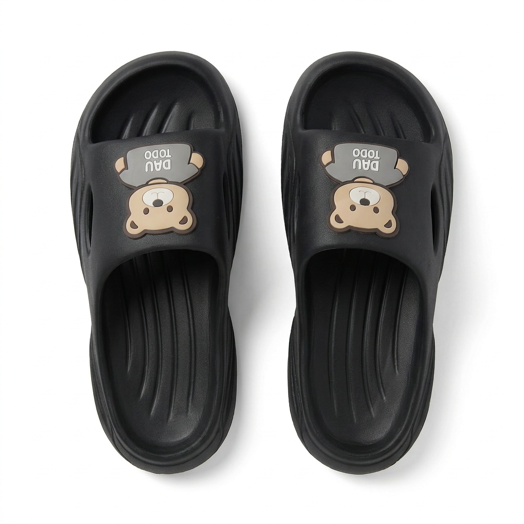 Black EVA slide slippers with brown bear face applique