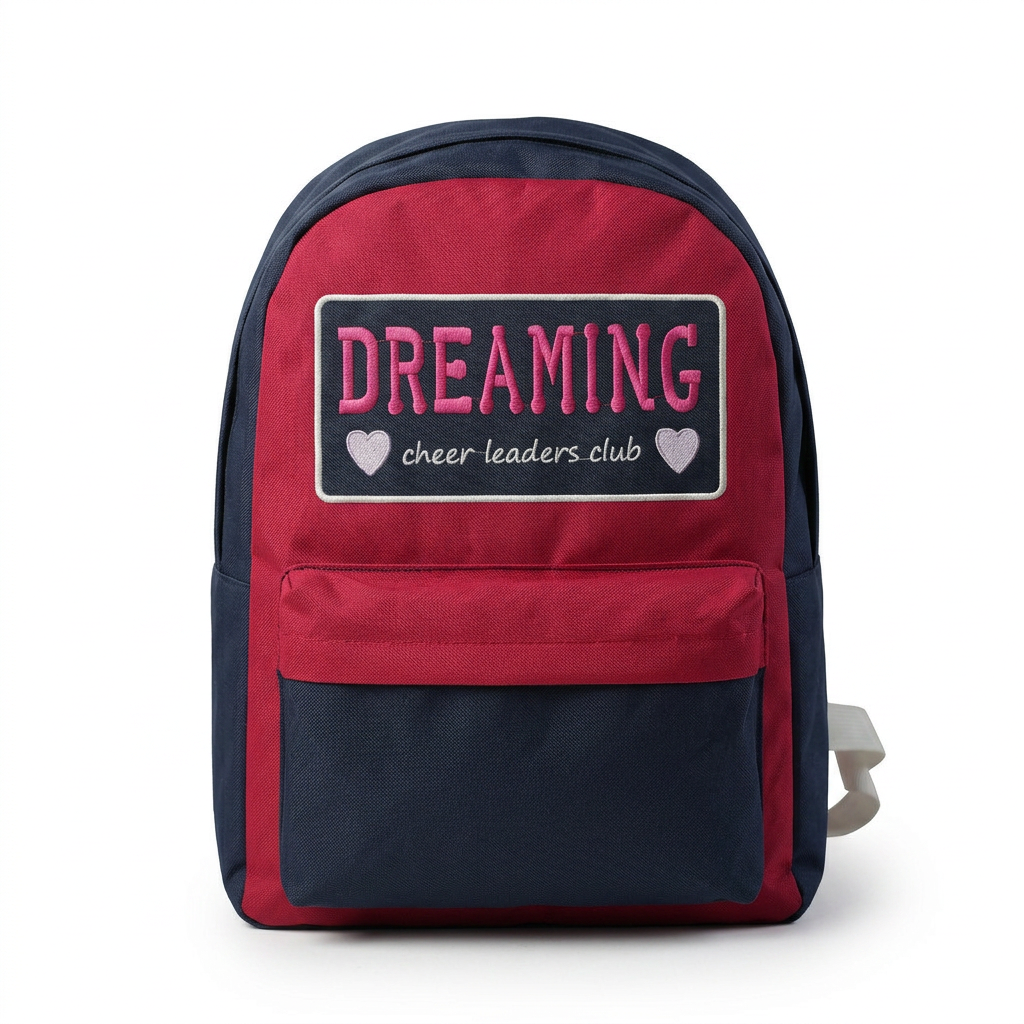 Red and navy school backpack with Dreaming cheer leaders club patch